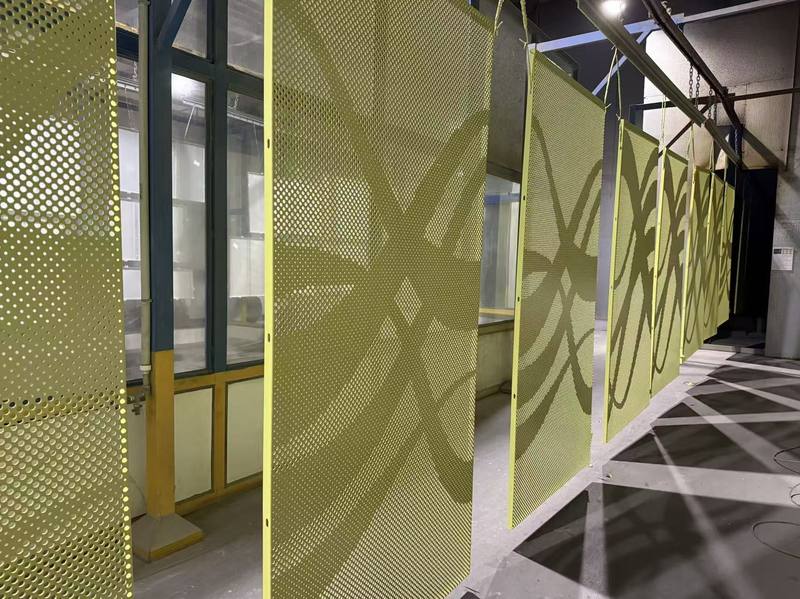 Spray coating line applying PVDF to fabricated panels