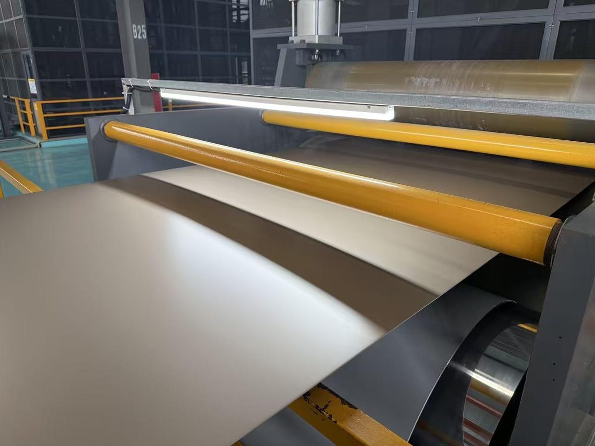 Four-roller precision coating head